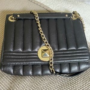 Kate Spade crossbody bag with gold accents